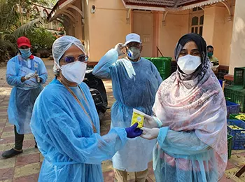 BRSC Trust volunteers handing immunity kits to healthcare workers